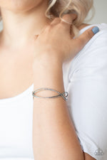 Load image into Gallery viewer, Paparazzi Bending Over Backwards Silver Bracelet

